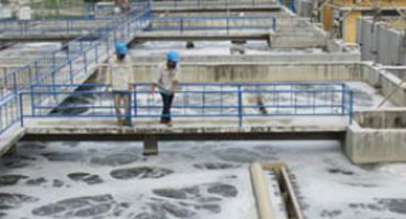 How does the industrial park use wastewater treatment measures?